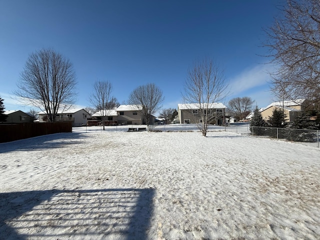 view of yard covered in snow