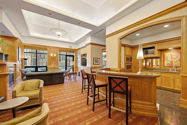 500 Grant St Unit 204, Minneapolis, MN 55404 - bar featuring stainless steel appliances, a decorative wall, a fireplace, recessed lighting, and a wainscoted wall