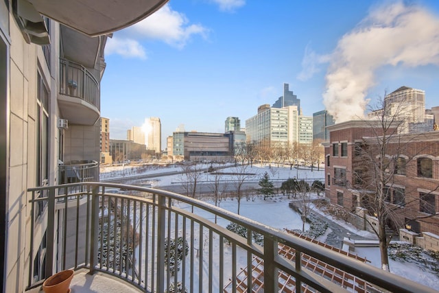 500 Grant St Unit 204, Minneapolis, MN 55404 - snow covered back of property with a view of skyline