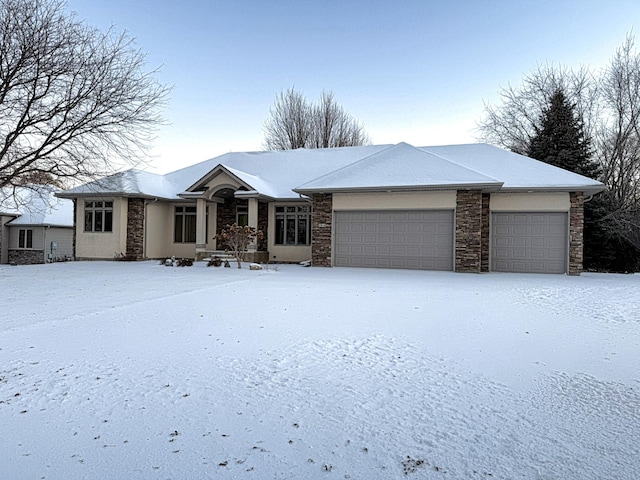 single story home with a garage