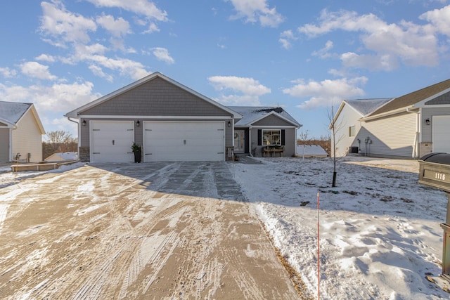 single story home featuring a garage