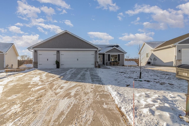 ranch-style home with a garage