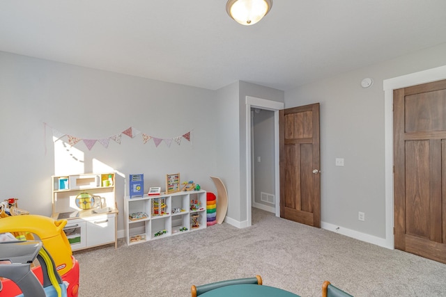 playroom featuring carpet flooring