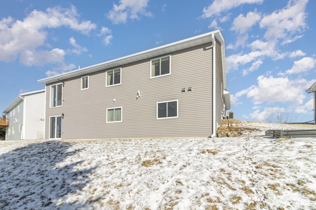 view of snow covered property