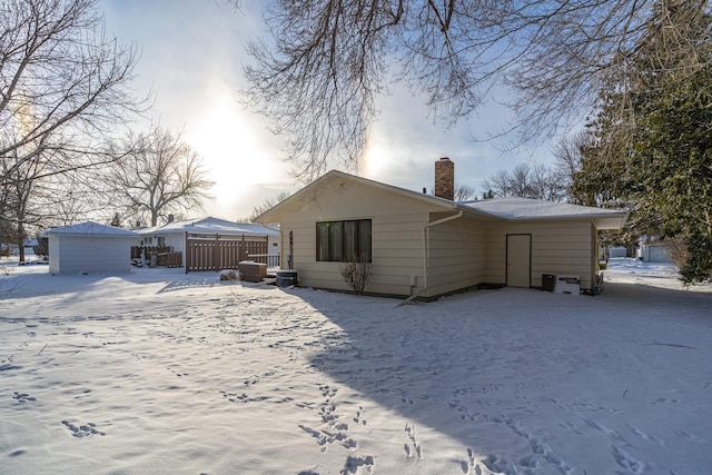 view of snow covered house