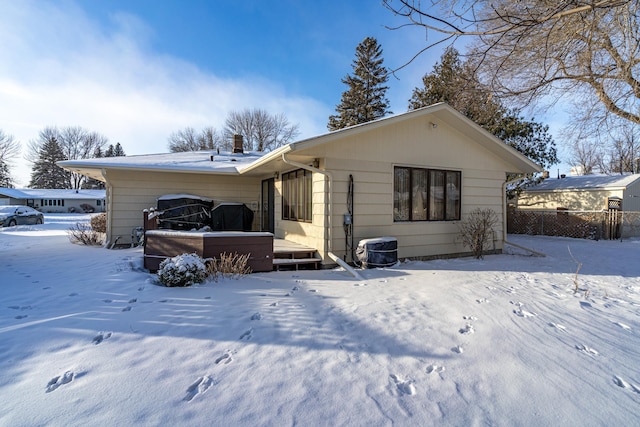 view of snow covered property