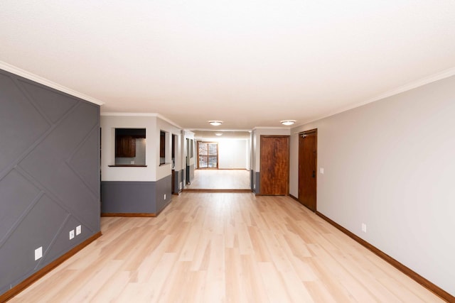 1720 3rd Ave S Unit 101, Minneapolis, MN 55404 - unfurnished room featuring light wood finished floors, baseboards, and crown molding