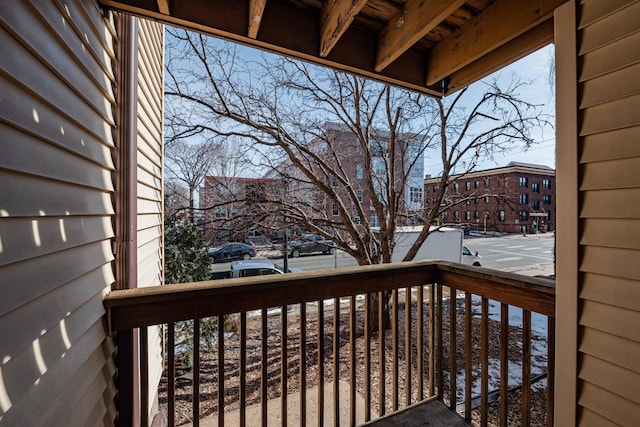 wooden terrace featuring a residential view