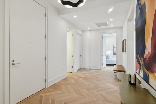 hallway with light parquet floors