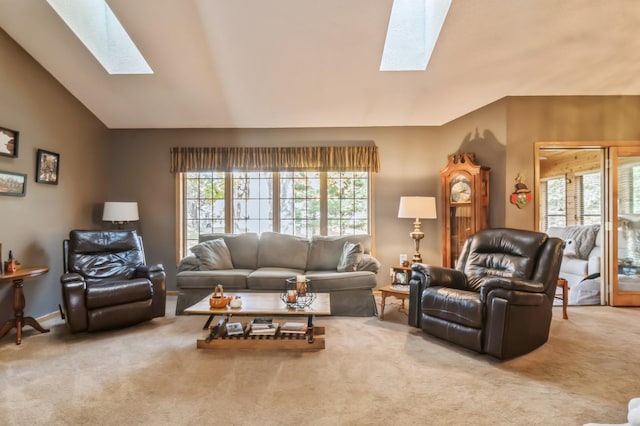 living room with carpet and vaulted ceiling with skylight