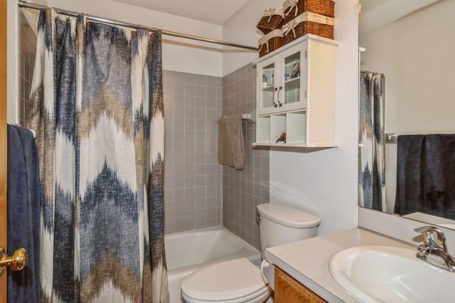 full bathroom featuring vanity, shower / tub combo with curtain, and toilet