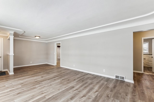 spare room featuring light wood-type flooring