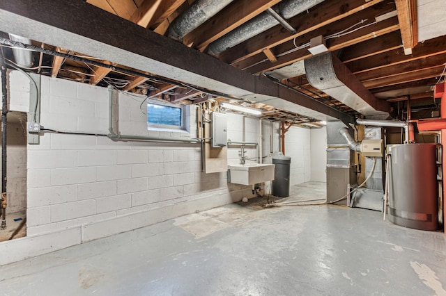 basement with heating unit, water heater, sink, and electric panel