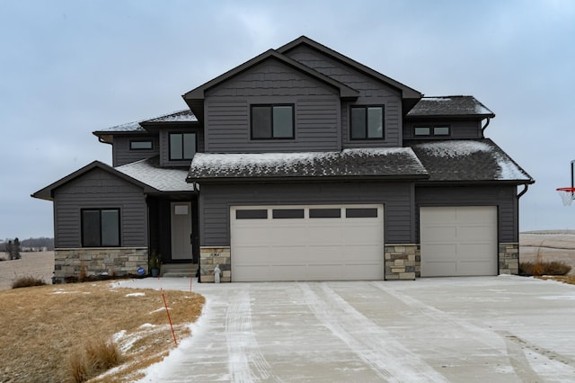 view of front of property featuring a garage