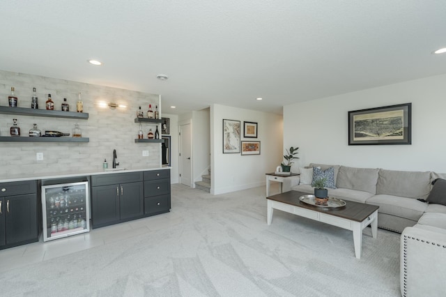 bar with wine cooler, light carpet, a sink, decorative backsplash, and indoor wet bar