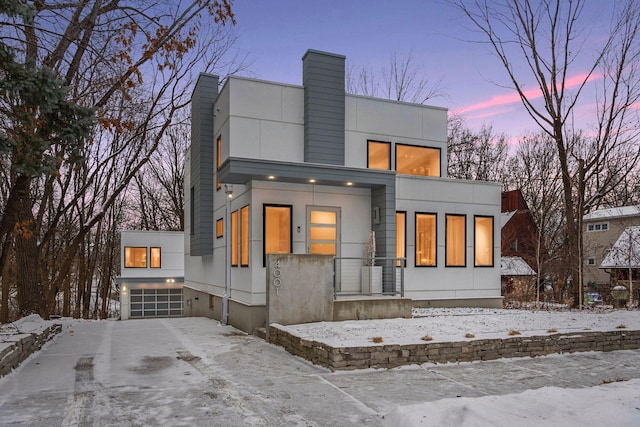 view of snow covered house