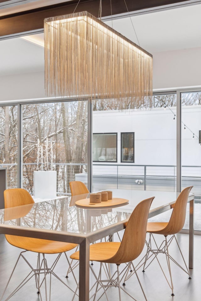 sunroom / solarium featuring a healthy amount of sunlight