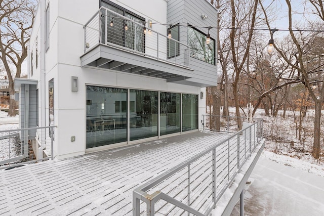 view of snow covered deck