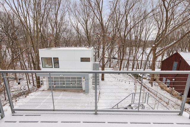 view of snow covered deck