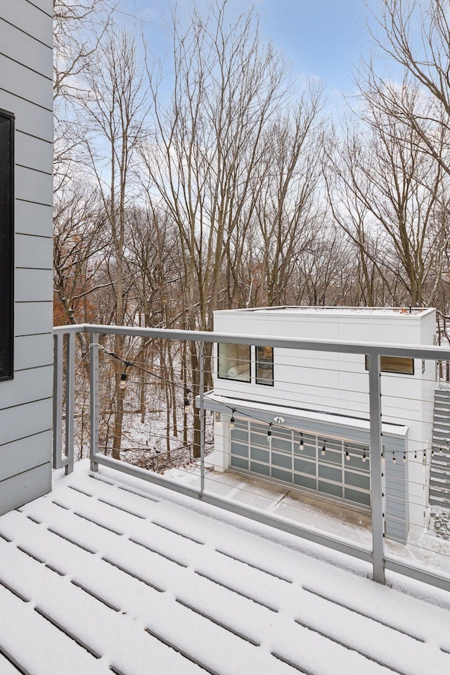 view of snow covered deck