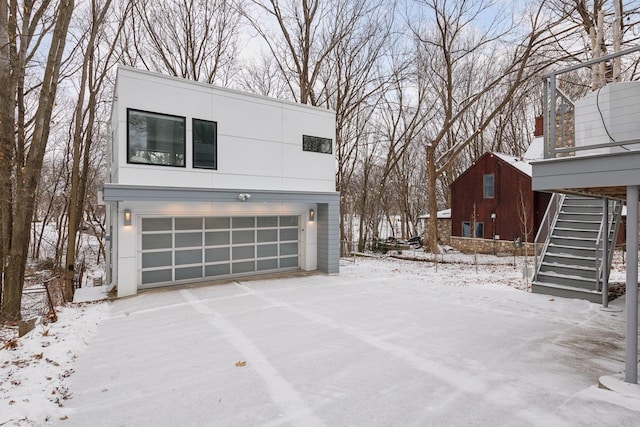 view of snow covered garage