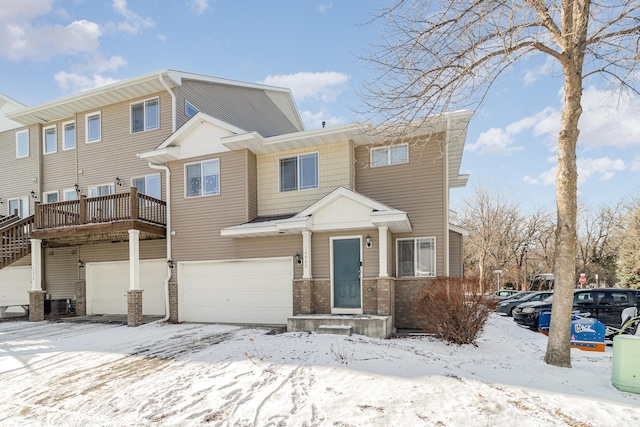 multi unit property featuring a garage