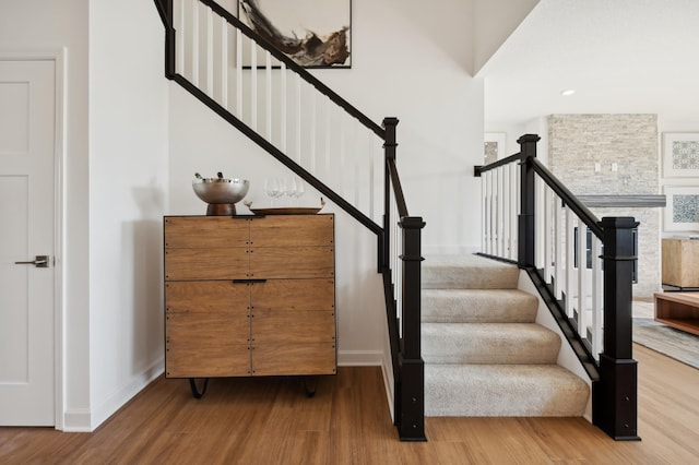 stairway featuring hardwood / wood-style floors