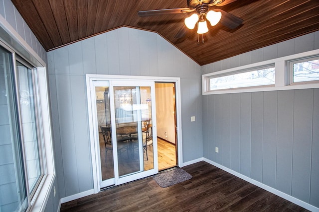 empty room with ceiling fan, wood ceiling, lofted ceiling, and wood-type flooring