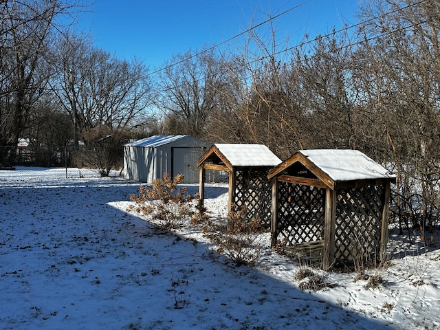 view of yard covered in snow