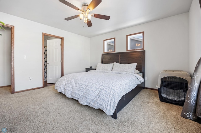 bedroom with ceiling fan and carpet flooring