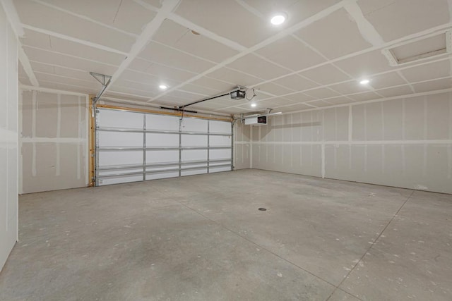 2834 Meadowview Ln NE, Owatonna, MN 55060 - garage with a garage door opener and recessed lighting