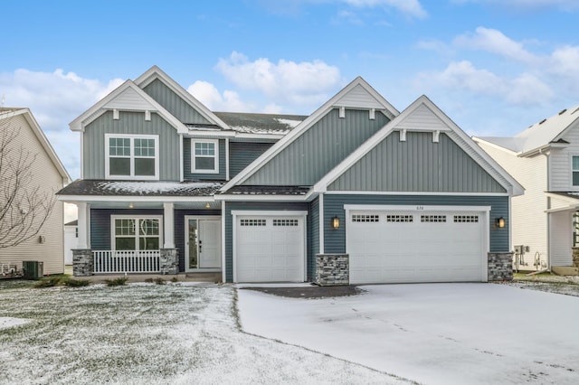 craftsman house featuring covered porch and central AC unit