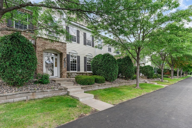 view of front of home with a front yard