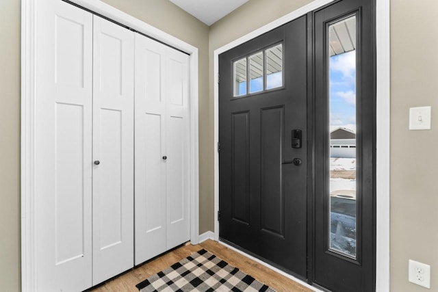 entrance foyer featuring light wood finished floors