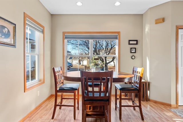 dining area with light wood-type flooring