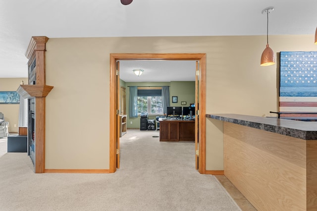 corridor with light colored carpet