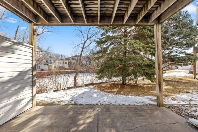 view of snow covered patio