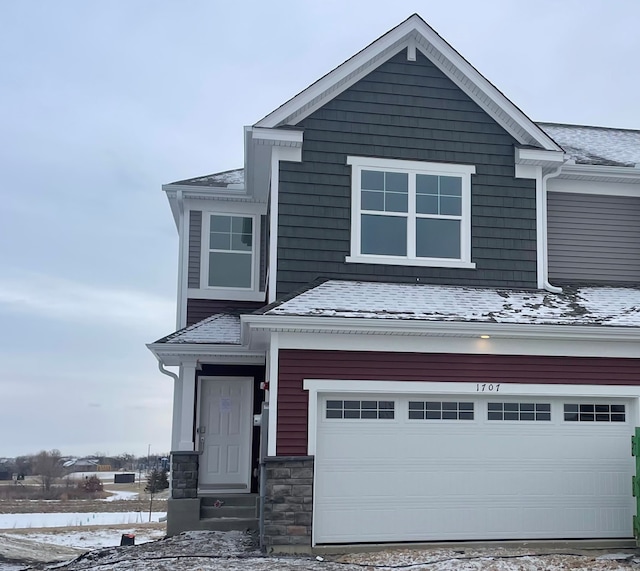 view of front of property featuring a garage