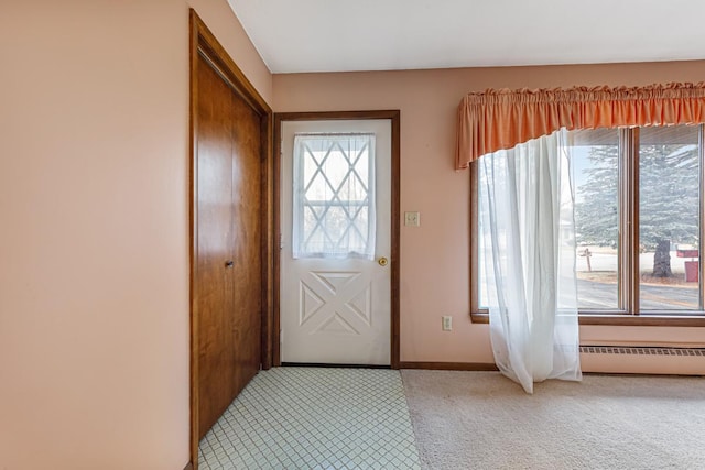 foyer featuring carpet floors