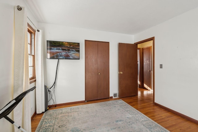 bedroom featuring light hardwood / wood-style flooring