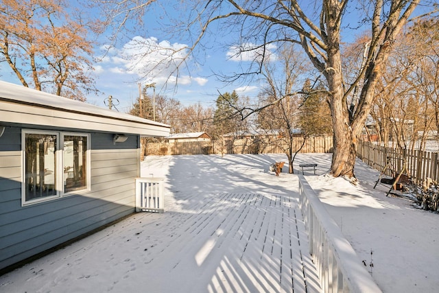 view of snow covered deck