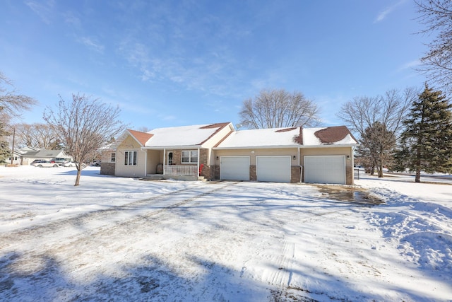 ranch-style house featuring a garage