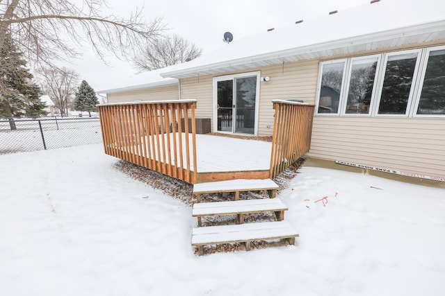 view of snow covered deck