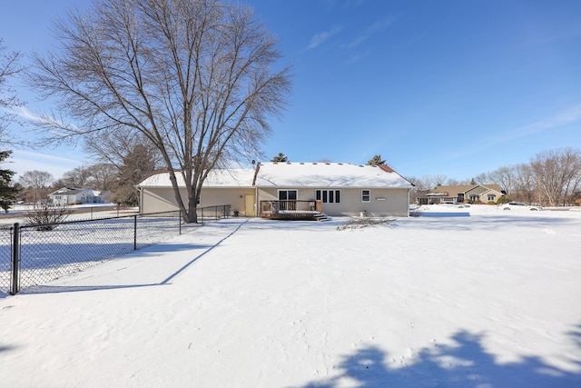 view of snow covered house