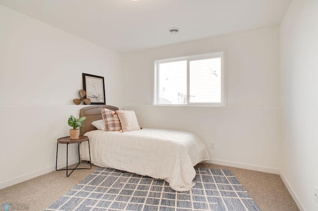 bedroom featuring carpet