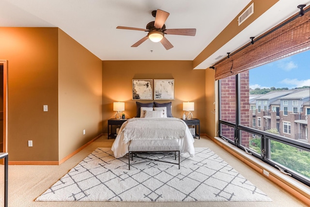 312 Spring St Unit 309, Saint Paul, MN 55102 - carpeted bedroom featuring baseboards and a ceiling fan