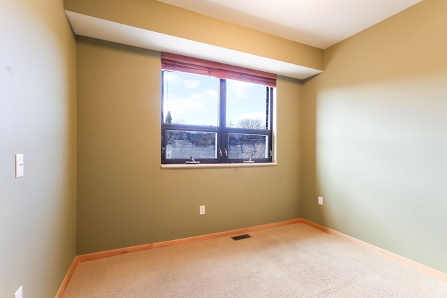 312 Spring St Unit 309, Saint Paul, MN 55102 - carpeted empty room featuring baseboards
