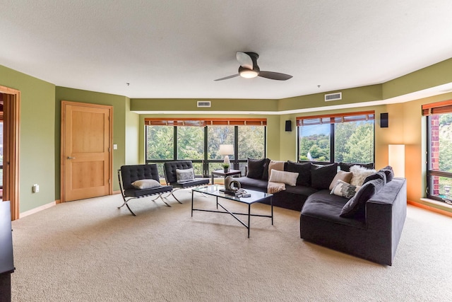 312 Spring St Unit 309, Saint Paul, MN 55102 - carpeted living area featuring ceiling fan and healthy amount of natural light