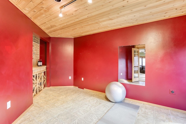 312 Spring St Unit 309, Saint Paul, MN 55102 - workout area featuring track lighting, wood ceiling, and tile patterned flooring