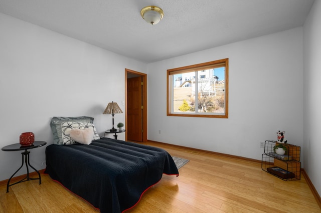 bedroom featuring light hardwood / wood-style flooring